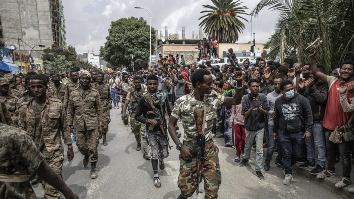 Captured Ethiopian government soldiers are marched under guard by Tigray Defense Force fighters through the city of Mekelle, Ethiopia on June, 25, 2021. (Finbarr O’Reilly/The New York Times)