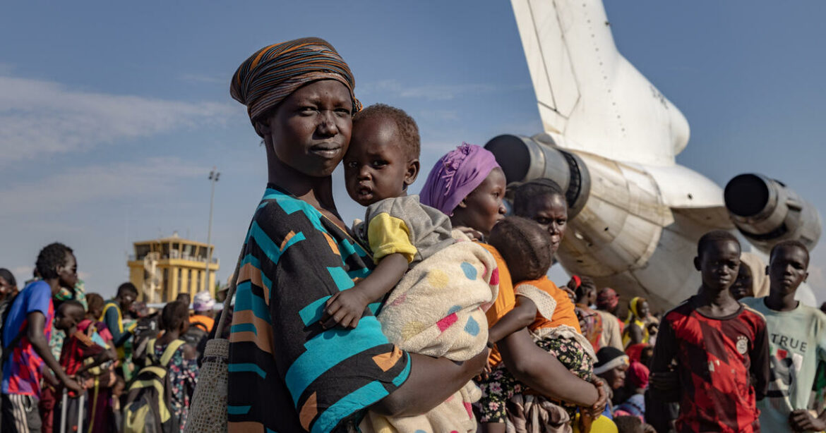 South Sudan. Returnees wait for cargo plane